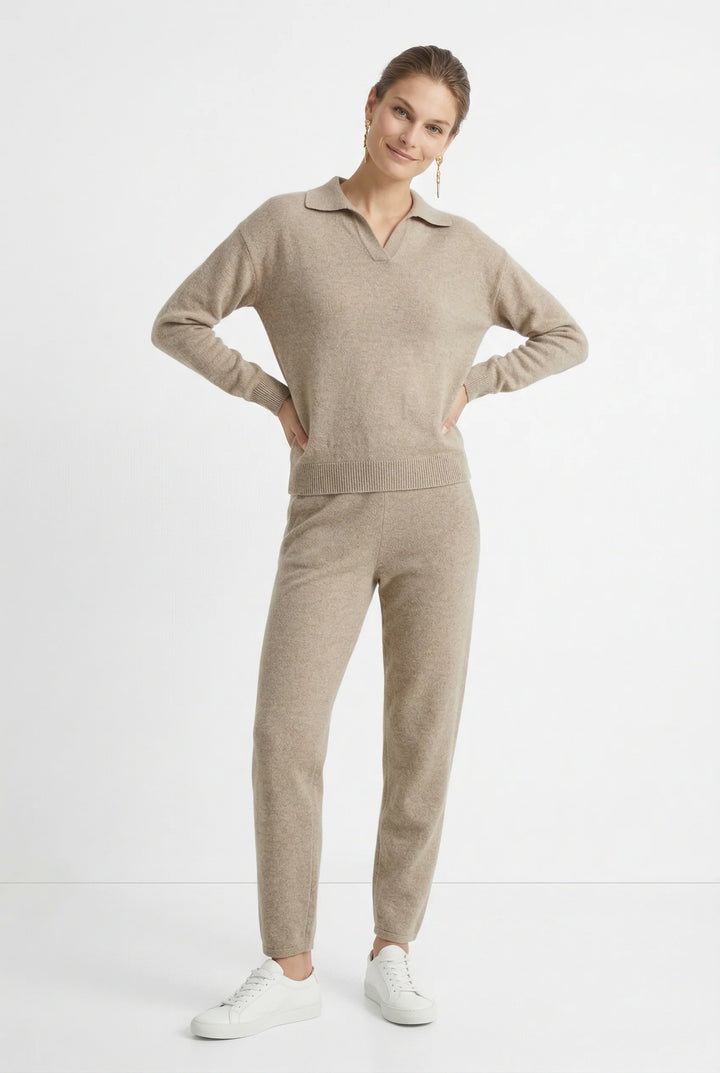 Woman in beige Merino lounge set with arms crossed showing relaxed day wear silhouette