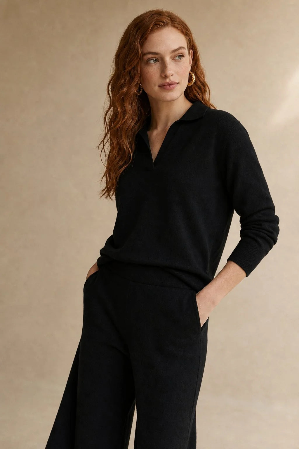 Close-up of Merino lounge set jumper polo collar and partial button placket detail