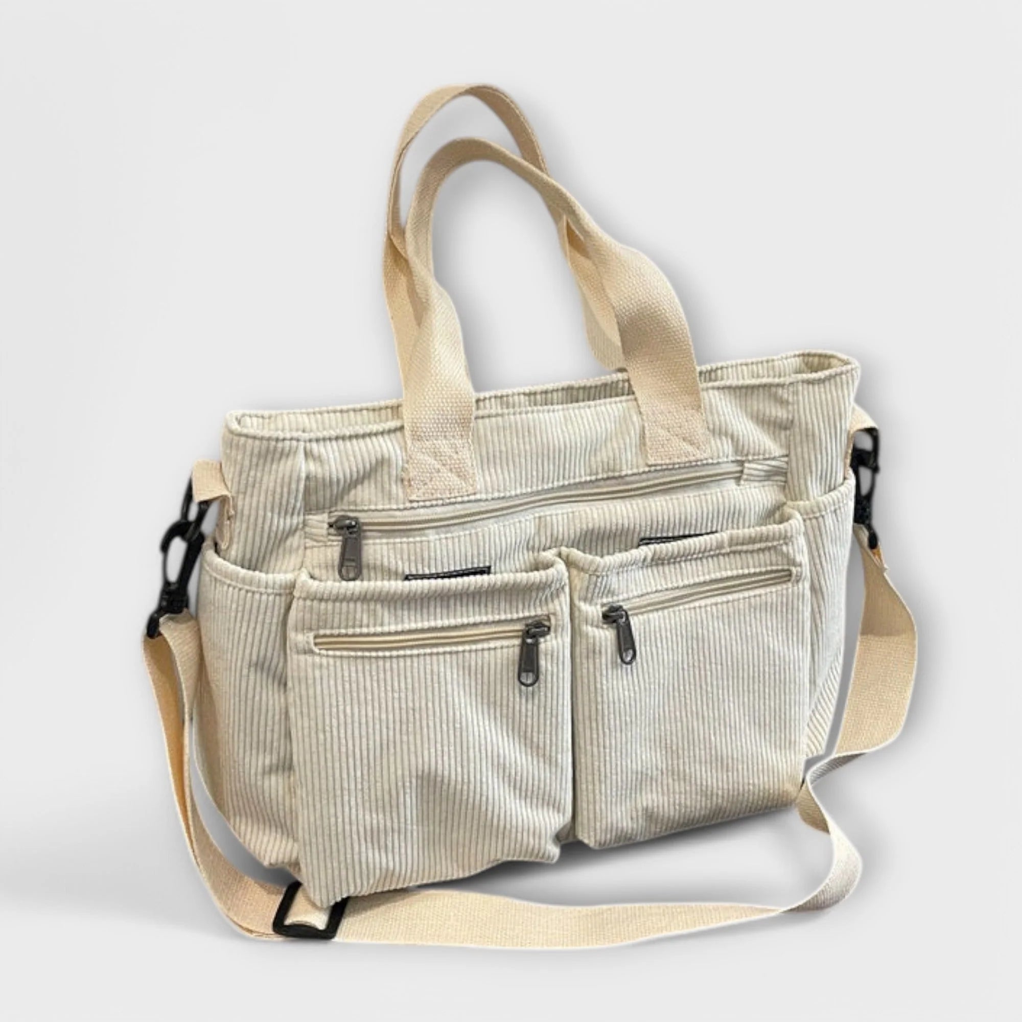 Women's corduroy tote bag in brown displayed against neutral backdrop