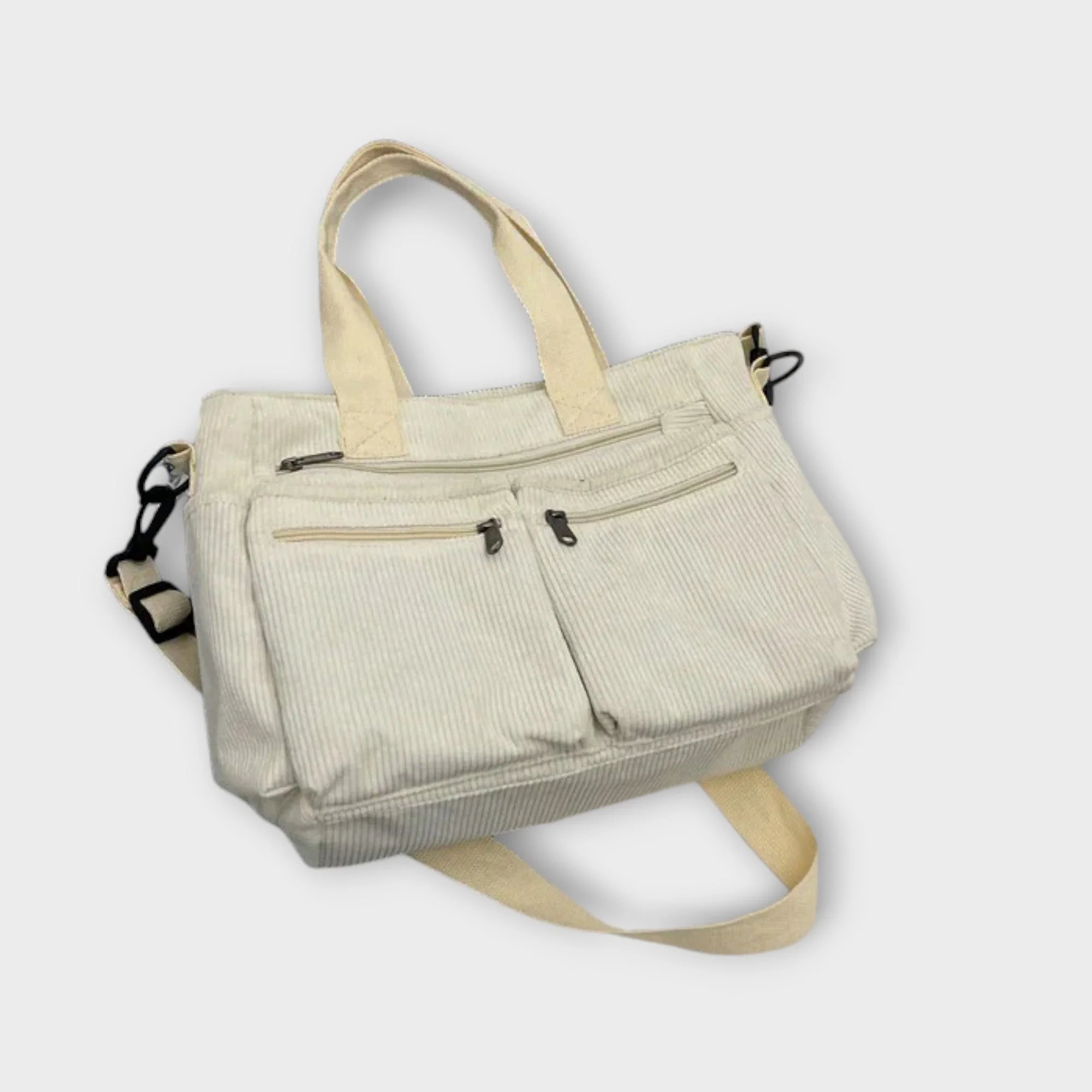 Full view of women's corduroy tote bag highlighting versatile carrying options