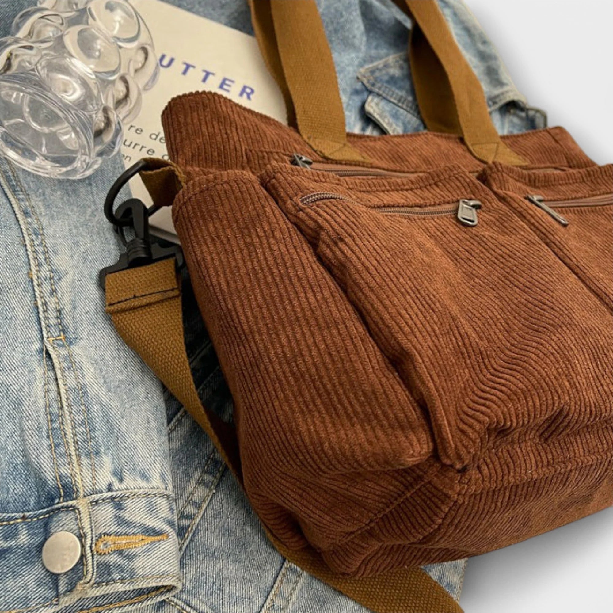 Women's corduroy tote bag flat lay showing spacious main compartment and organisational features