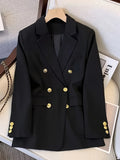 Women's double breasted tailored blazer in black with gold-tone buttons and notch lapel collar