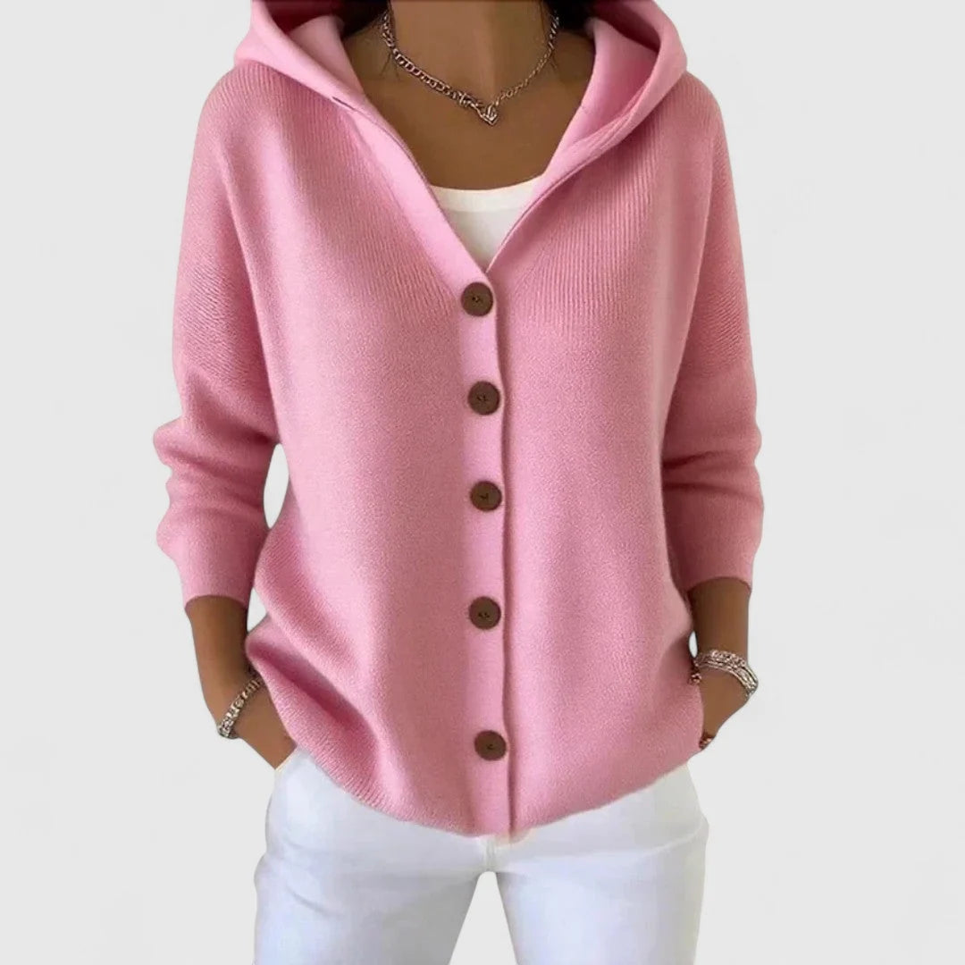 Side view of women's relaxed cardigan showing drape and hood construction