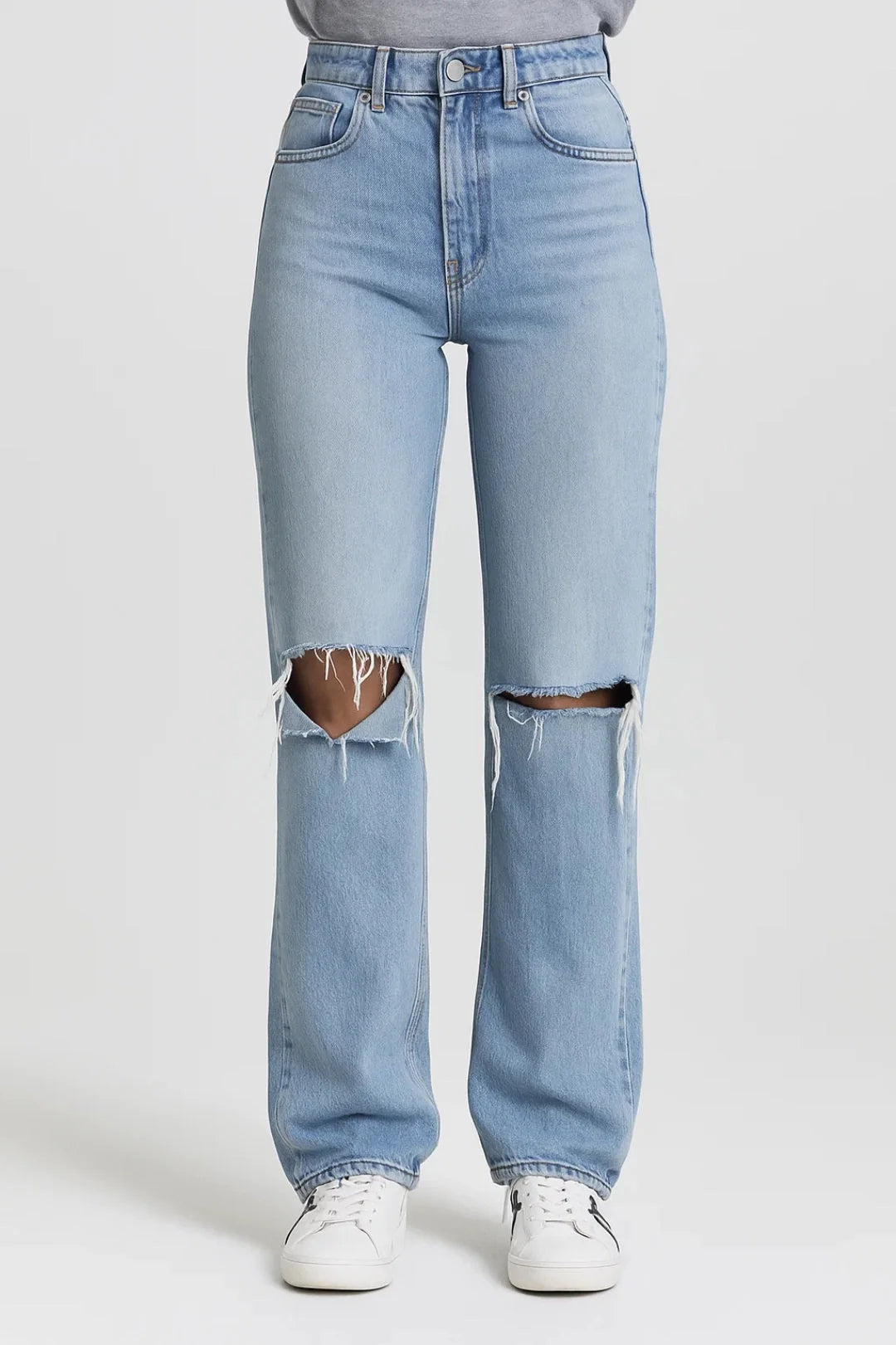 Women's straight leg jeans with high waist and ripped knee detail in light wash denim
