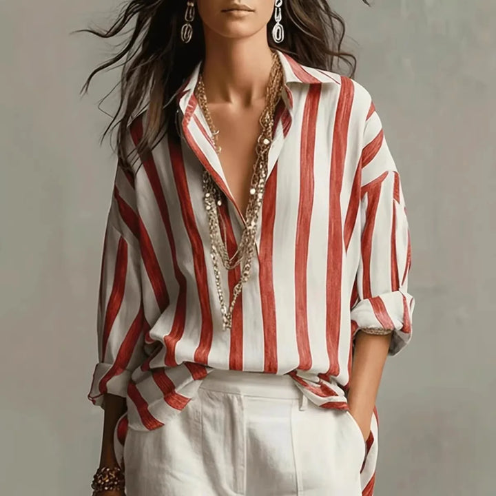 Side view of women's striped linen shirt showing relaxed silhouette and hip-length hem