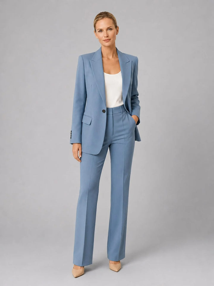 Women's tailored suit set in pale blue with single-breasted blazer and high-waist straight-leg trousers on model