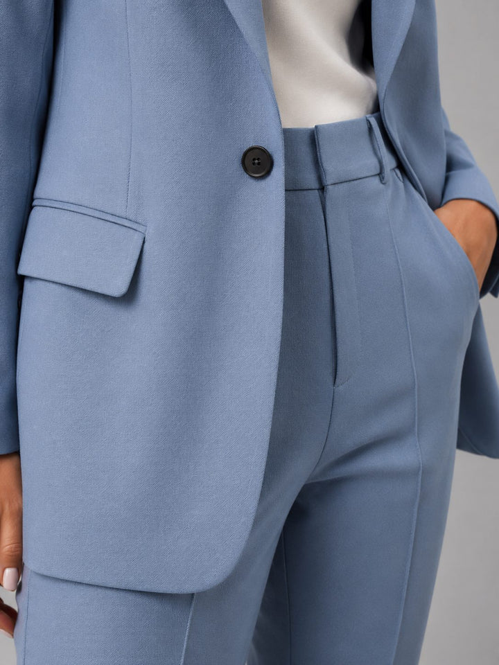 Front view of women's tailored suit set showing notch lapel blazer and matching high-waist trousers