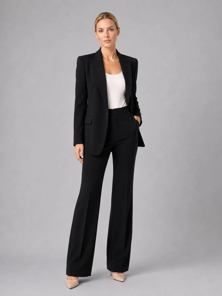 Women's tailored suit set showing high-waist trouser fit and straight-leg cut to ankle