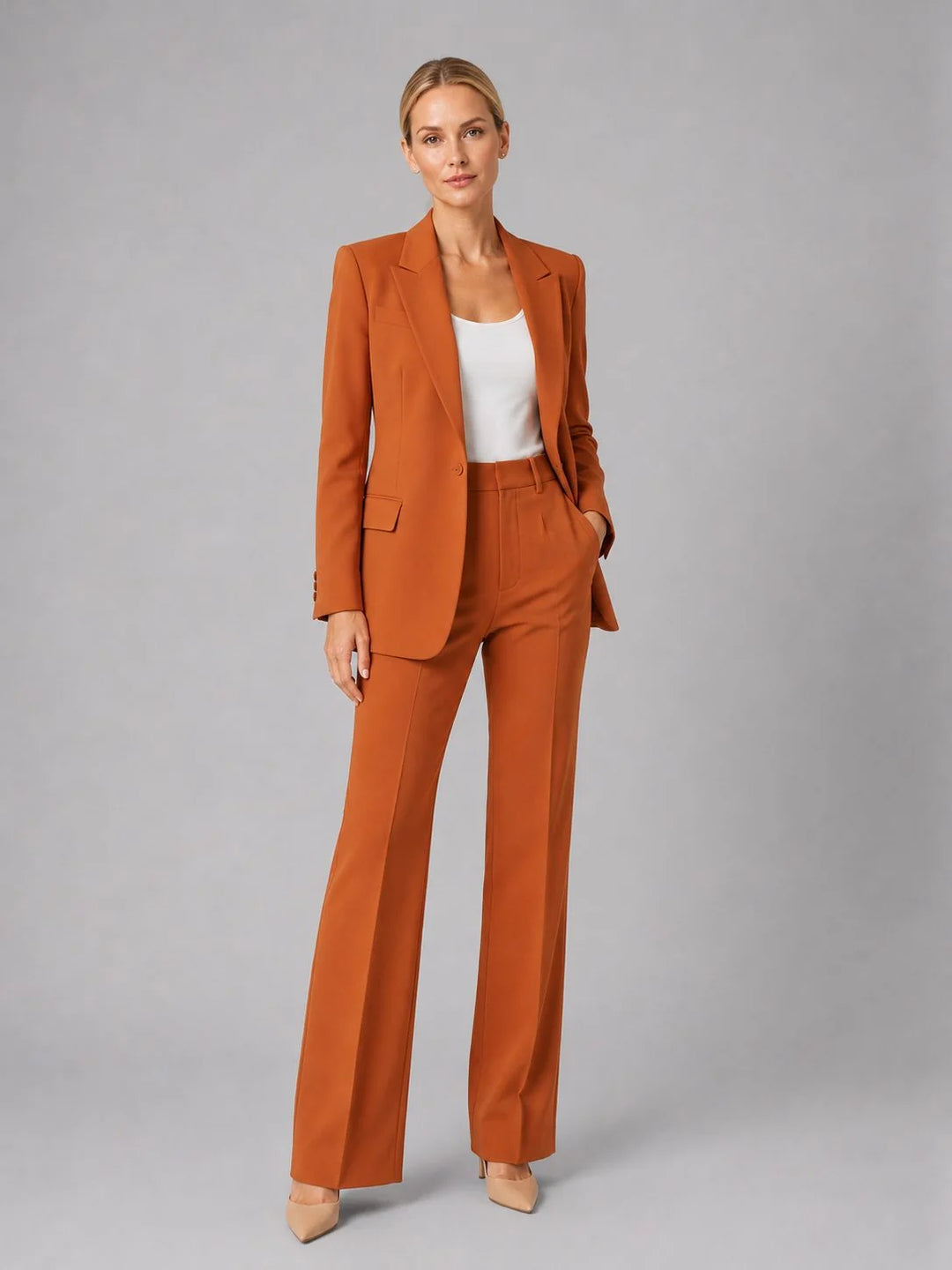 Back view of women's tailored suit set displaying blazer structure and trouser drape