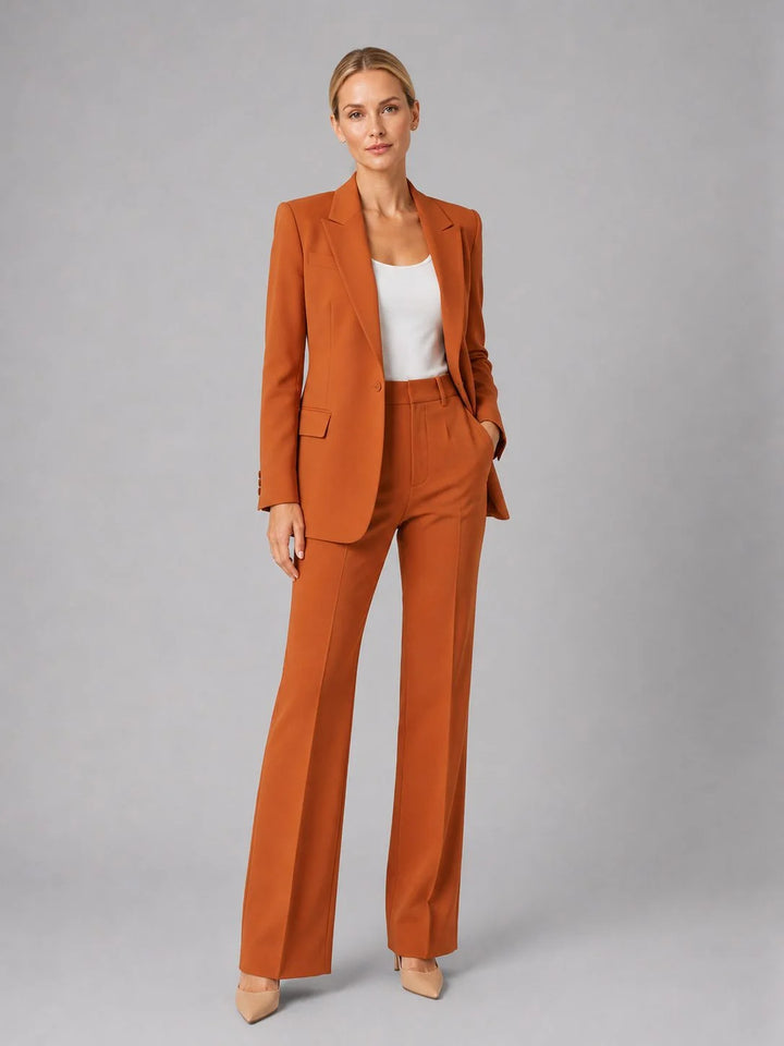 Back view of women's tailored suit set displaying blazer structure and trouser drape