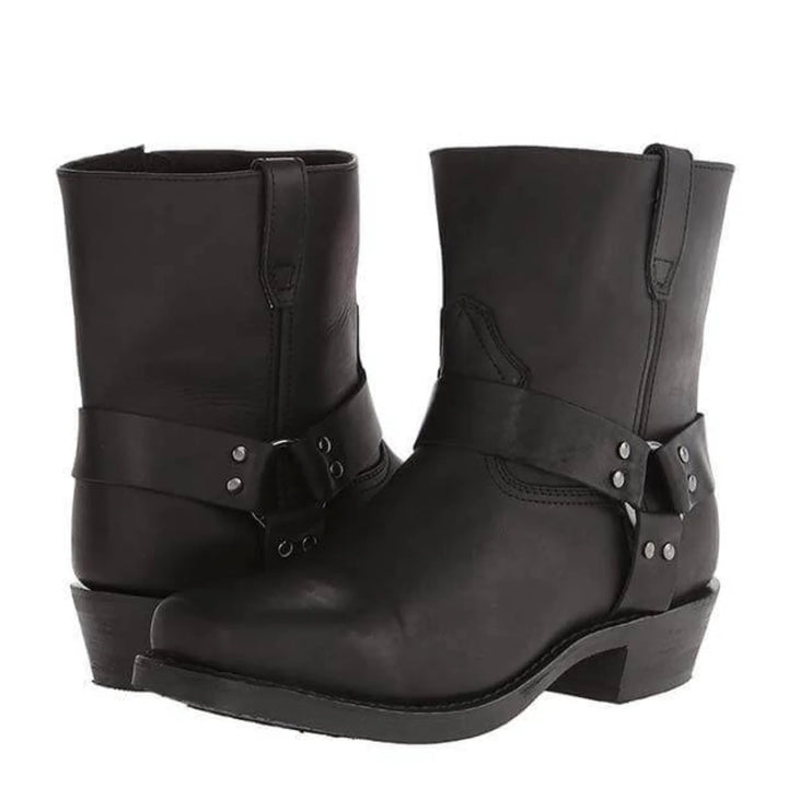 Men's harness ankle boots with metal stud detailing and side zip visible