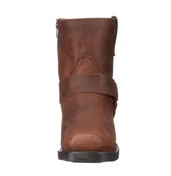 Three-quarter view of men's harness ankle boots in brown with visible stitching detail