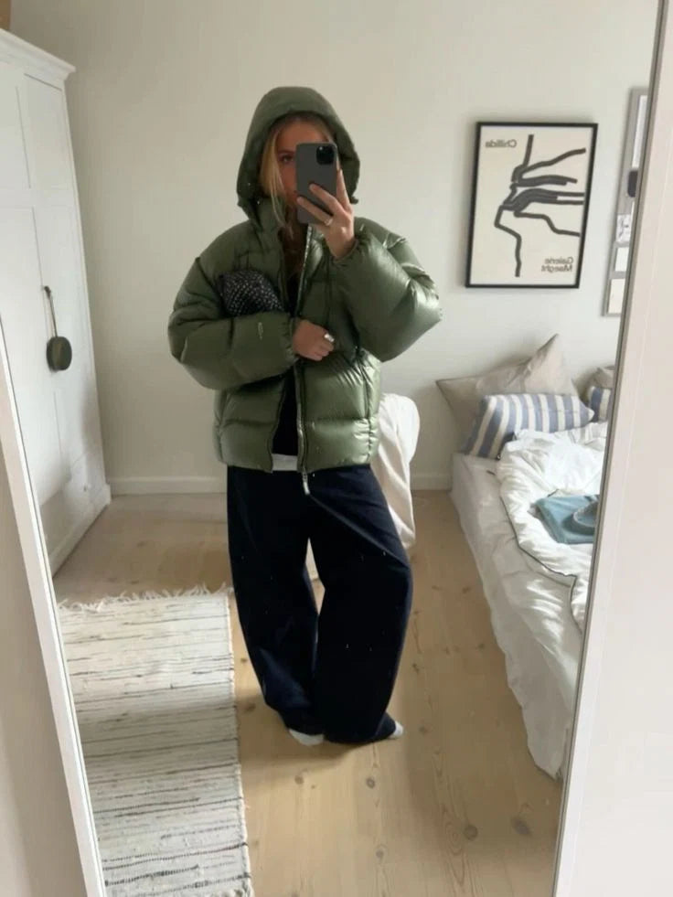 Men's puffer jacket layered over joggers for relaxed weekend styling
