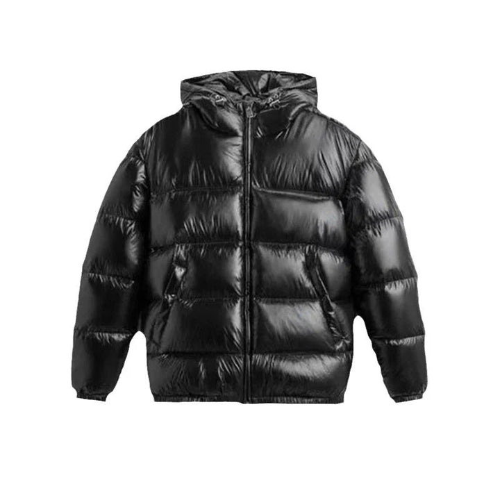 Men's puffer jacket styled for casual wear with grey joggers and white trainers