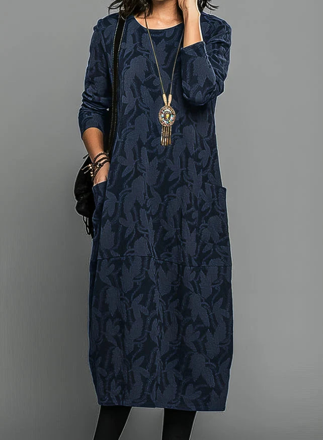Side angle of jacquard midi dress highlighting below-knee length and structured silhouette