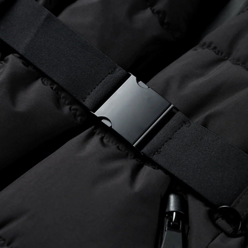 Side view of women's puffer jacket highlighting cinched waist and flattering silhouette