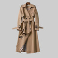 Women's belted trench coat in beige with double-breasted front and longline silhouette