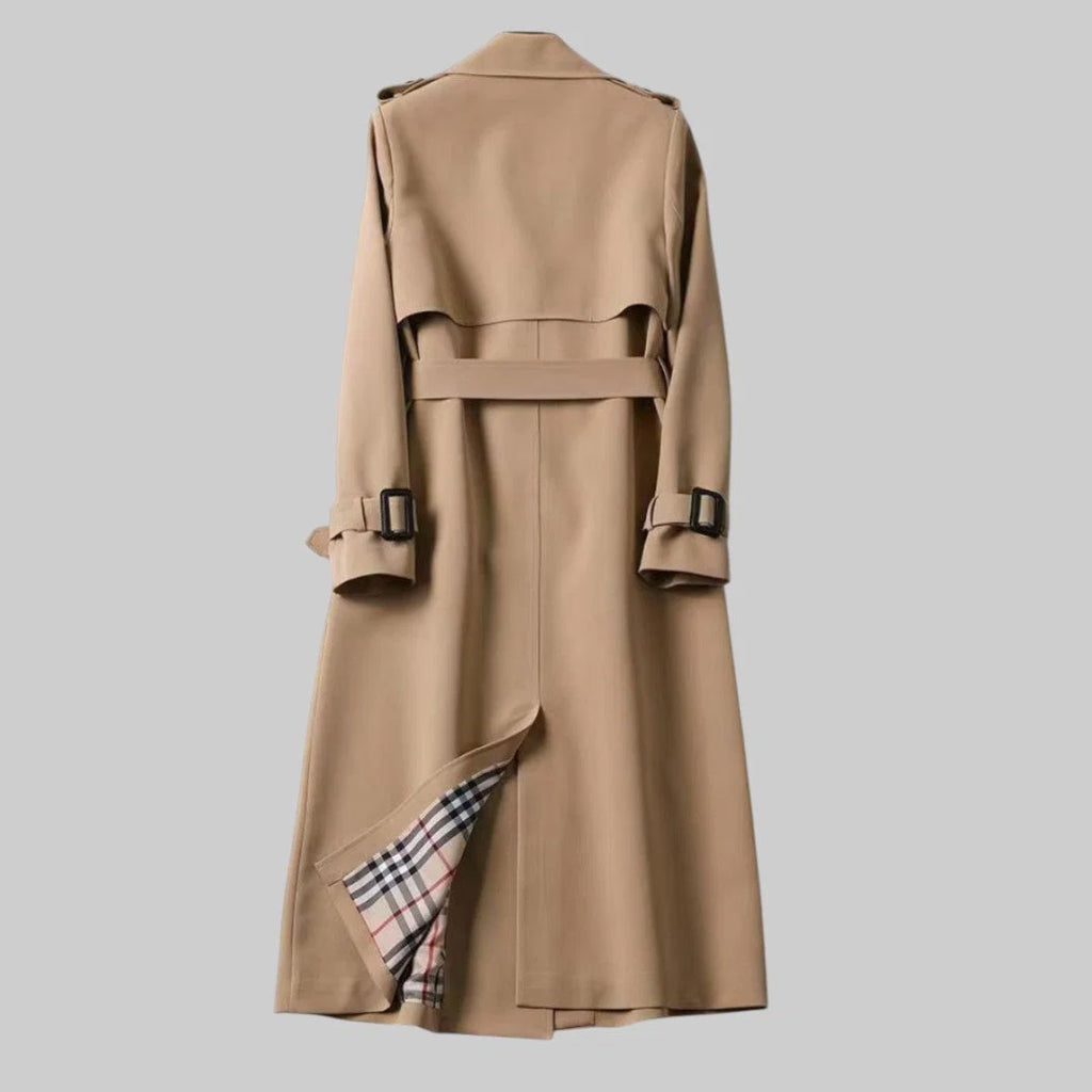 Classic longline trench coat for women with smooth fabric finish and belt