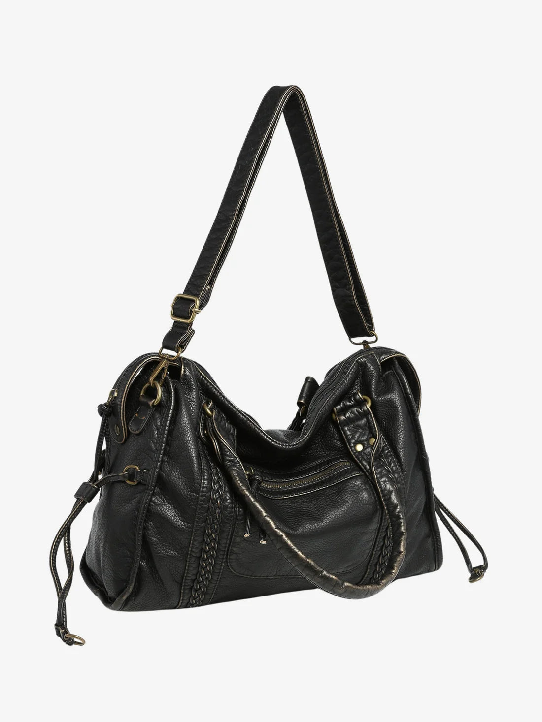 Side view of gathered tie detail with tassel ends on textured shoulder bag