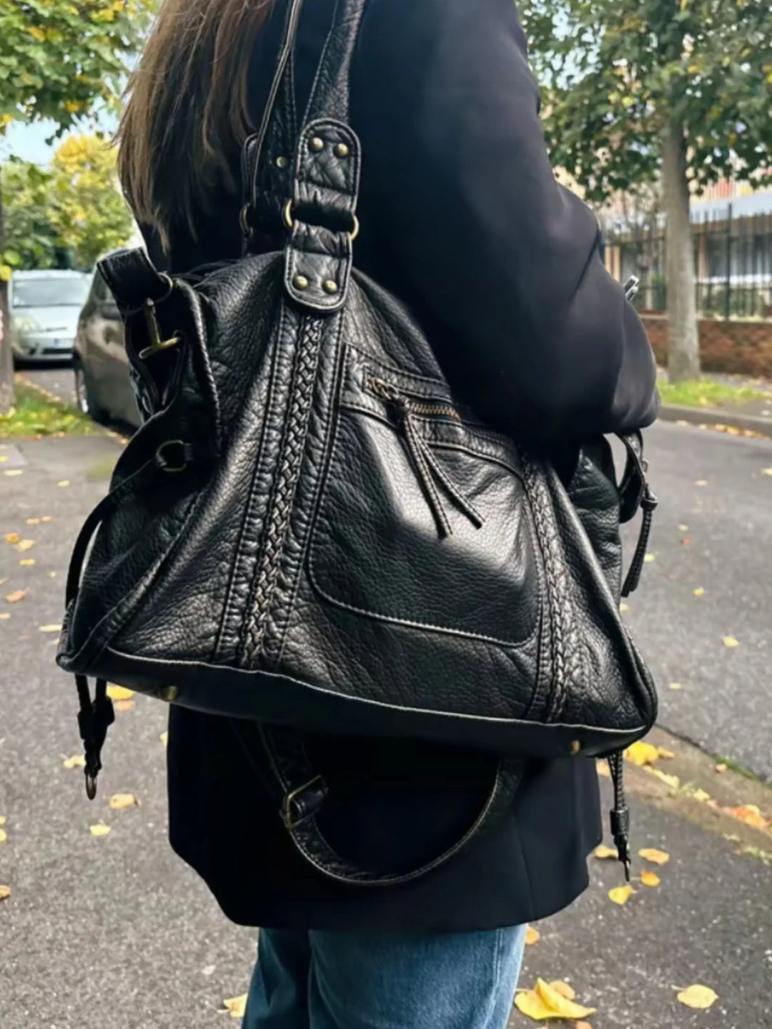 Interior view showing spacious main compartment and organisational pockets in shoulder bag