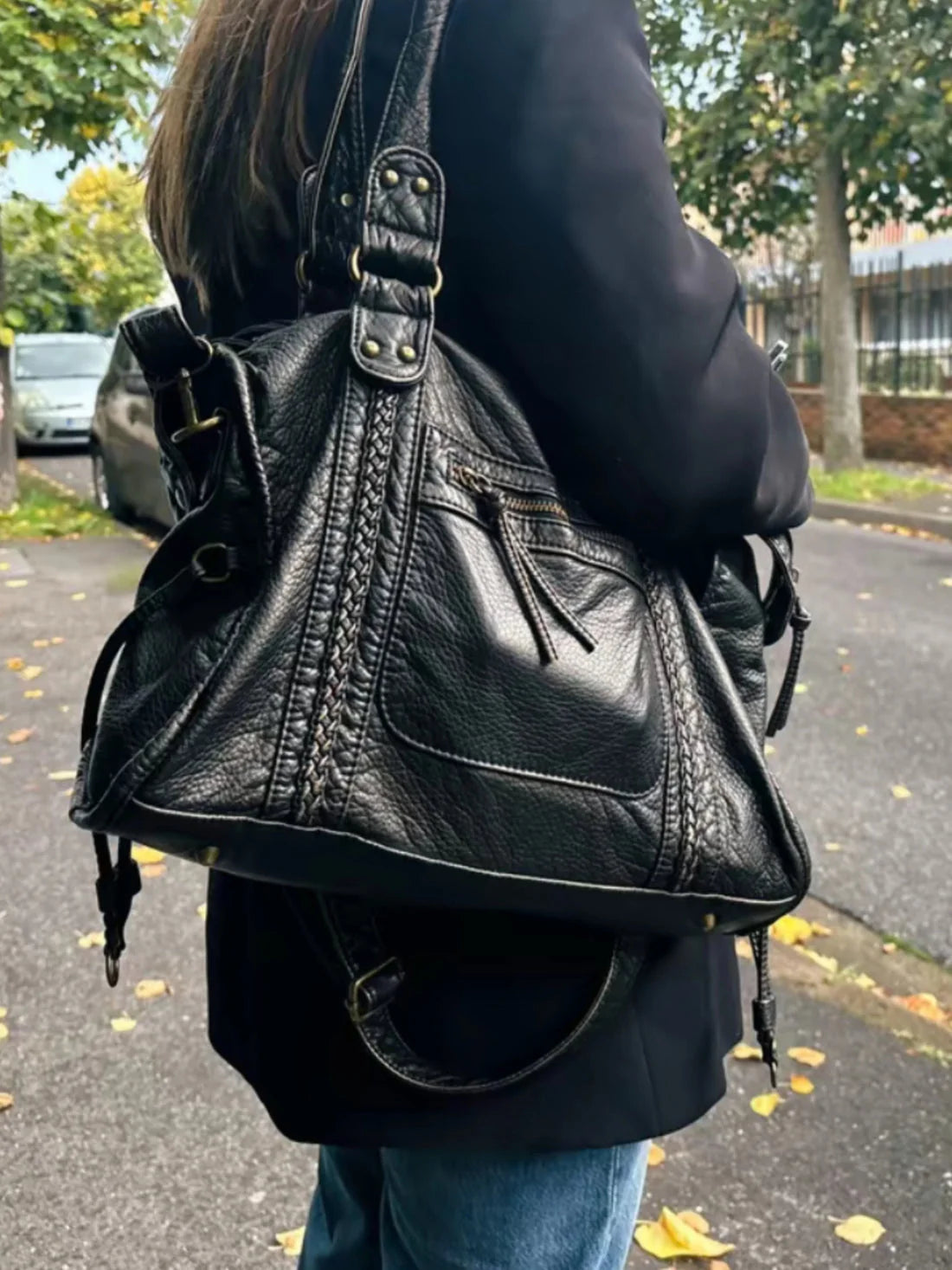 Interior view showing spacious main compartment and organisational pockets in shoulder bag