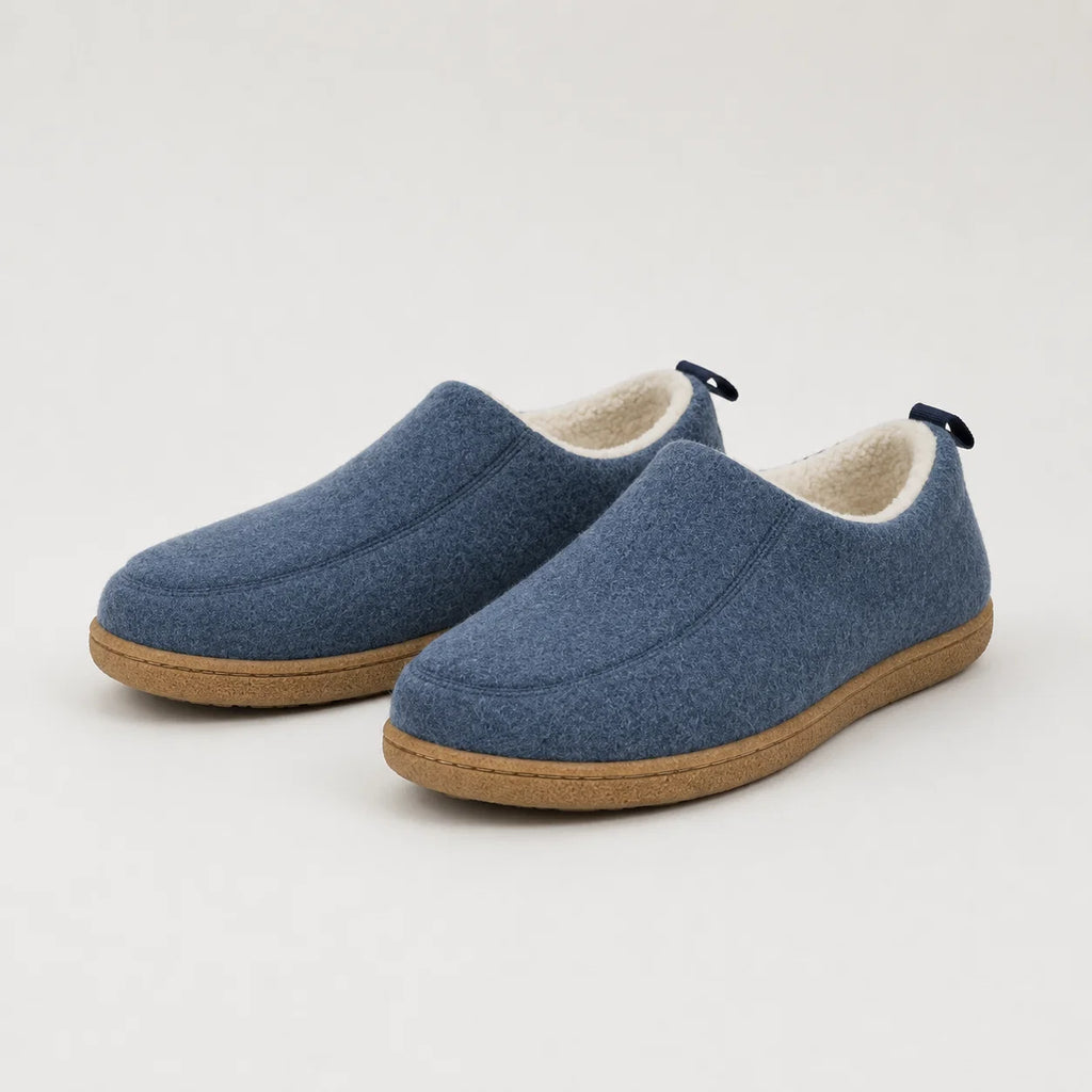 Eleanor women's fleece-lined slippers in blue with textured upper and rubber sole