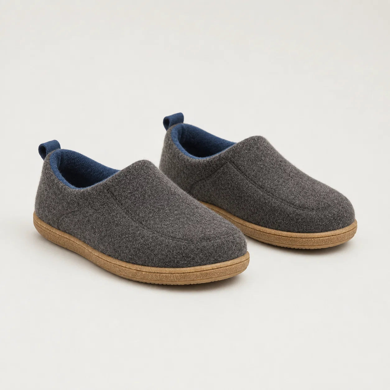 Close-up of textured blue slipper upper with cosy fleece trim