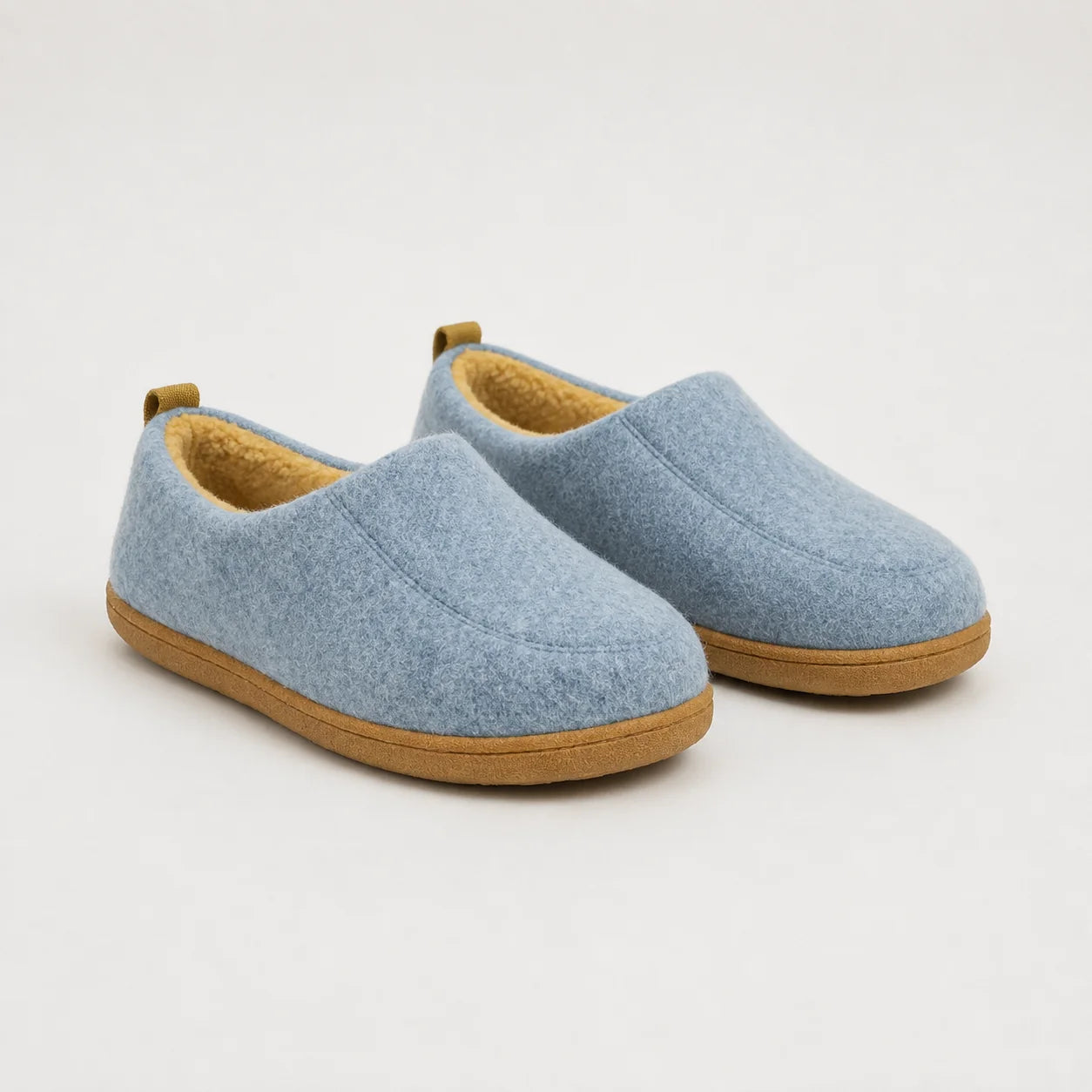 Women's indoor slippers showing durable rubber sole and supportive construction
