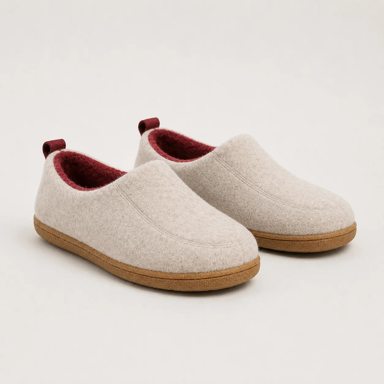 Pair of blue fleece-lined slippers with slip-on design for home wear
