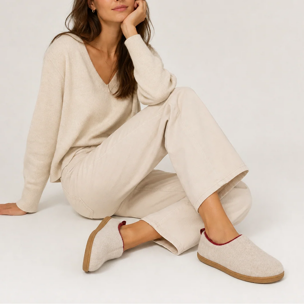 Detail of women's slipper heel tab and fleece lining for easy wear