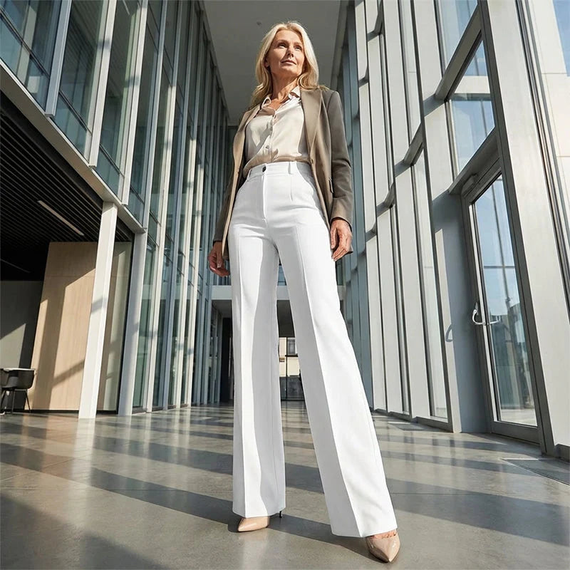 Close-up of structured fabric texture and smooth finish on wide leg trousers