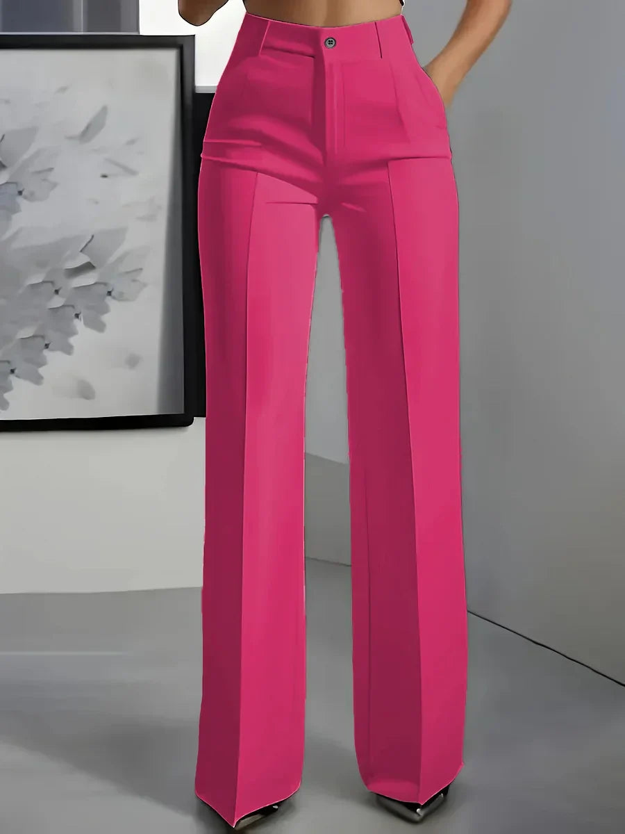 Full-length view of straight cut wide leg trousers with smooth fabric drape