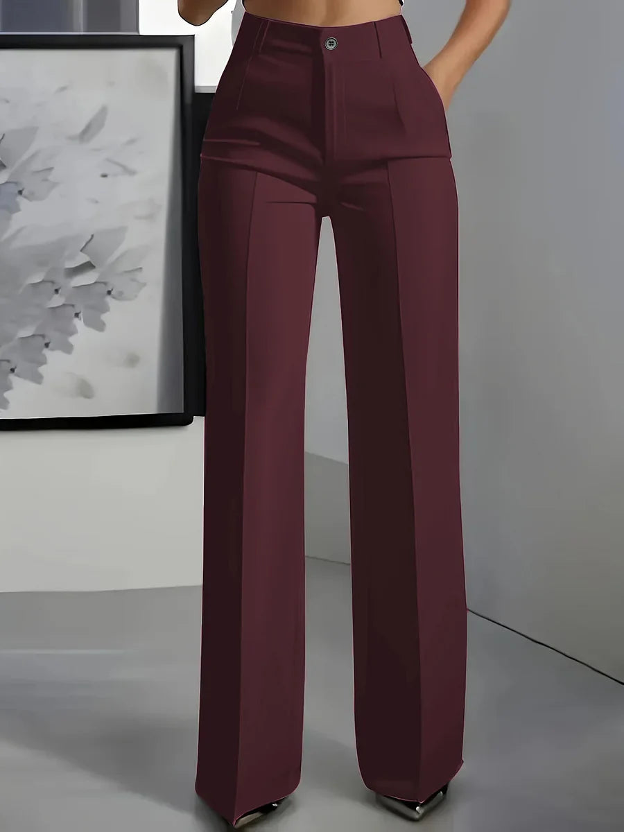 Back view of wide leg trousers showing clean straight silhouette and full-length hem