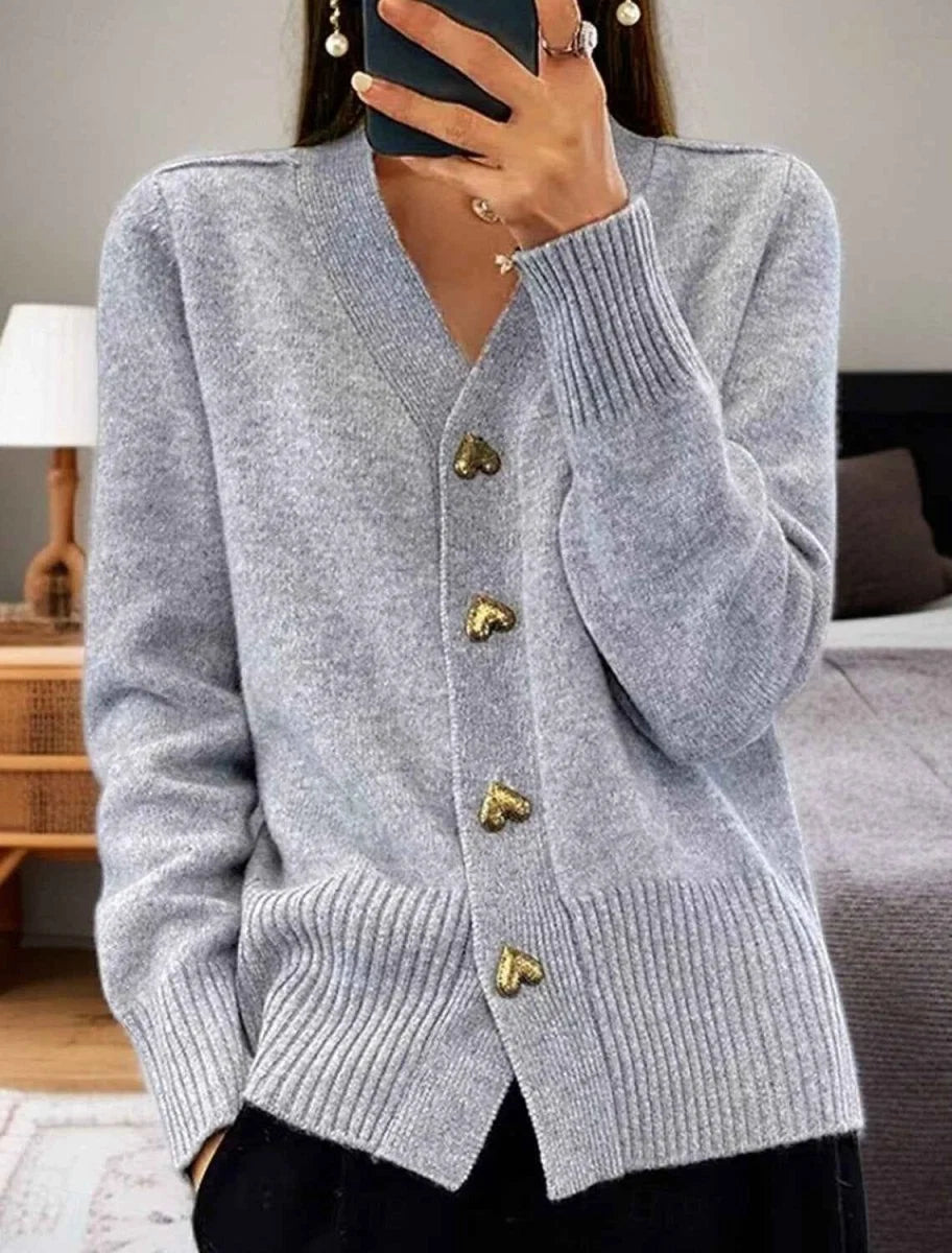 Women's knit cardigan with V-neckline and gold heart-shaped buttons in soft grey knit fabric