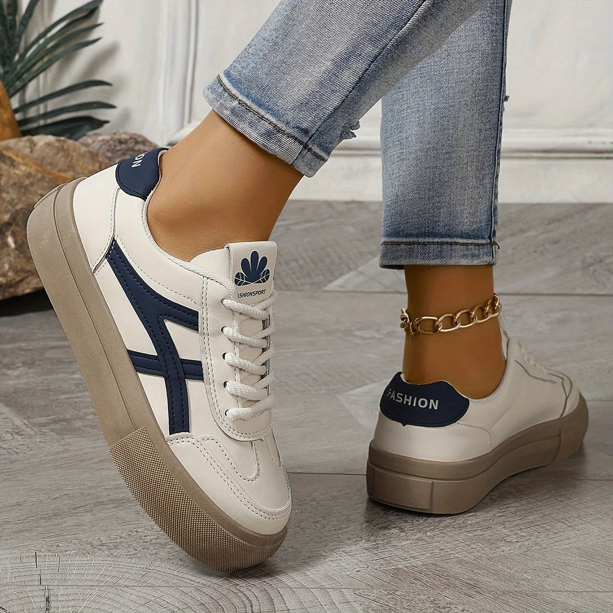 Close-up of women's platform trainers showing lace-up design and textured chunky sole