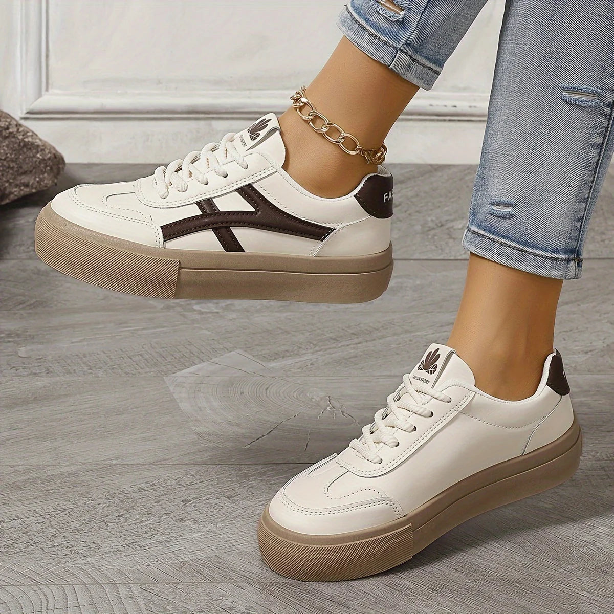 Women's platform trainers in beige with navy stripe detail and cushioned footbed