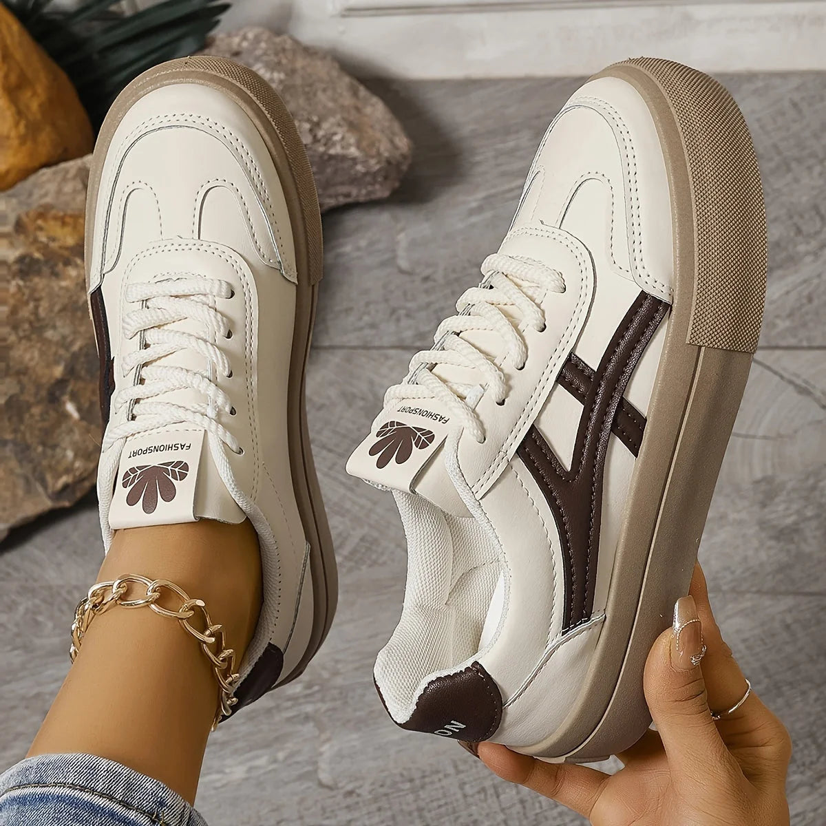 Women's platform trainers with chunky sole worn casually for everyday comfort