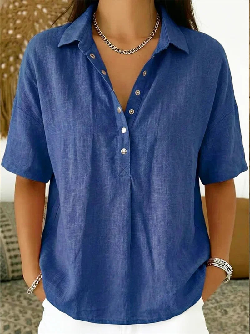 Side view of women's relaxed collar shirt displaying relaxed fit and lightweight fabric drape