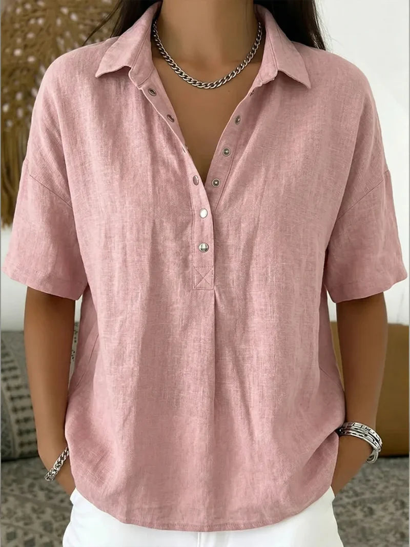Back view of women's relaxed collar shirt showing relaxed silhouette and fabric drape