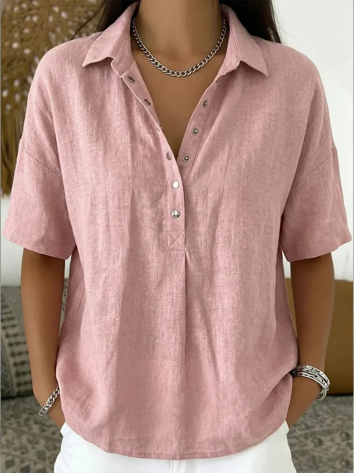 Back view of women's relaxed collar shirt showing relaxed silhouette and fabric drape