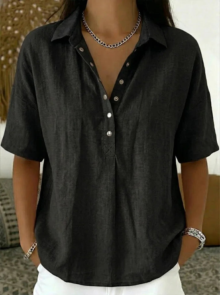 Women's relaxed collar shirt in blue styled for casual daytime occasions
