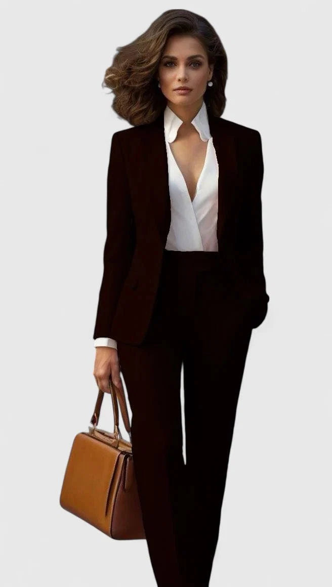 Close-up of women's tailored suit blazer showing notch lapels and single-button closure