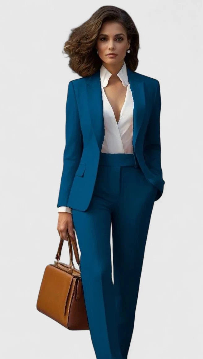 Women's tailored suit blazer detail showing flap pockets and tailored seam construction