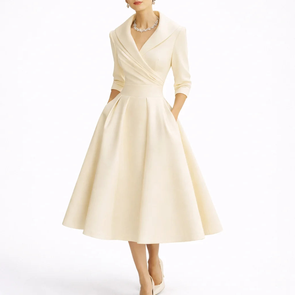 Back view of collared midi dress highlighting A-line skirt and tailored fit