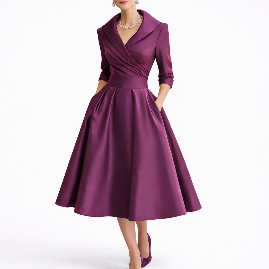 Detail shot of collar and V-neckline on wrap-style midi dress