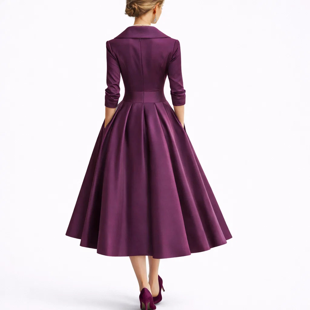 Full-length view of collared midi dress showing knee-length hemline and elegant drape
