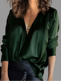 Satin V-neck blouse with deep draped neckline and long sleeves in rich green