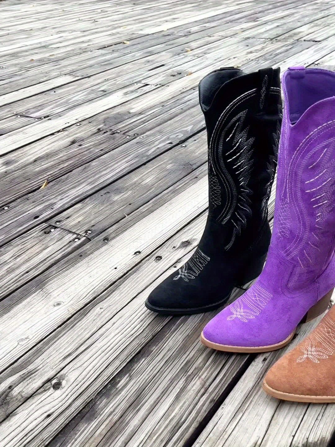 Full view of women's cowboy boots featuring embroidered patterns and rounded toe design