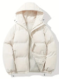 Close-up view of women's black puffer jacket showing quilted padding and adjustable drawstring hood detail
