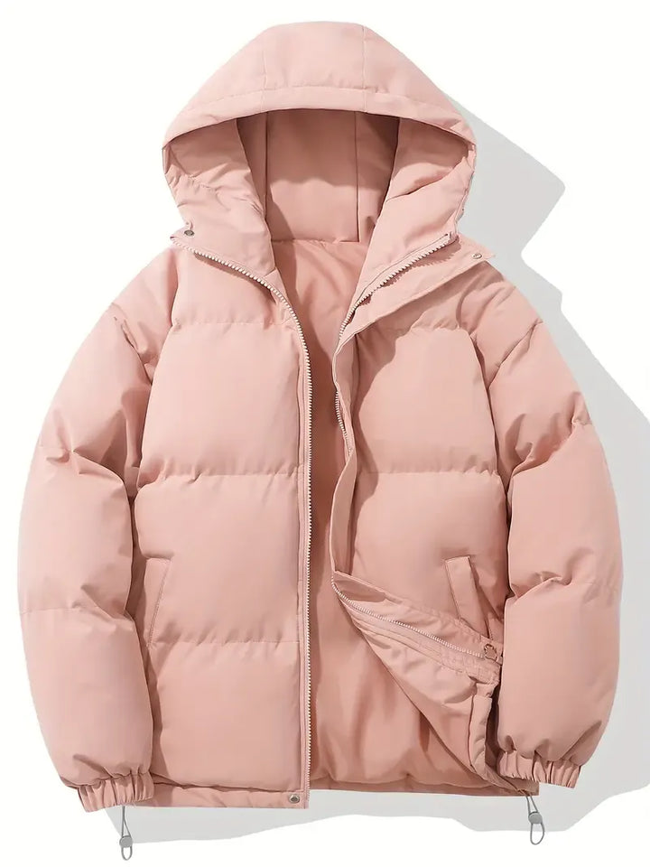 Detail of women's puffer jacket hood with drawstring adjustment and quilted insulation padding